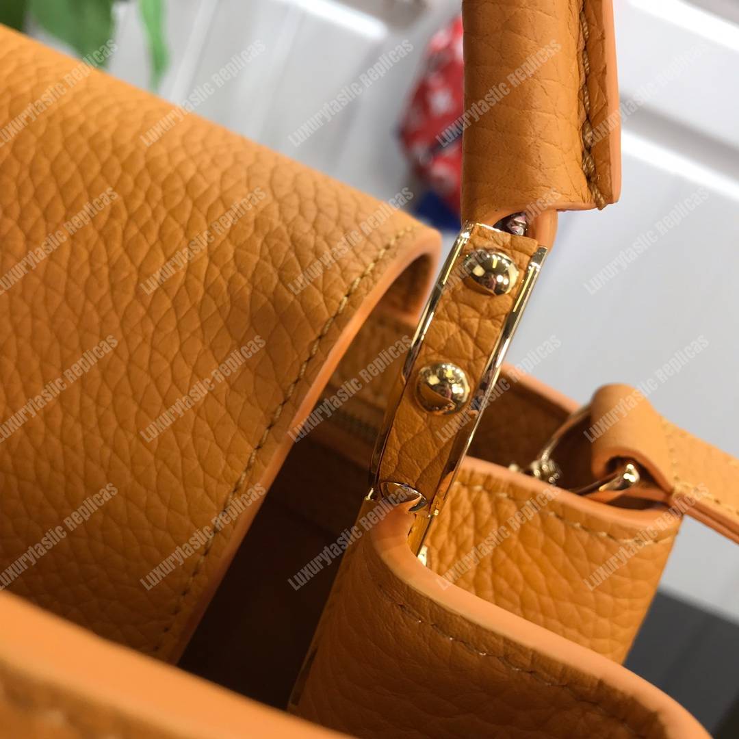 LV Capucines PM Taurillon Leather Ocre