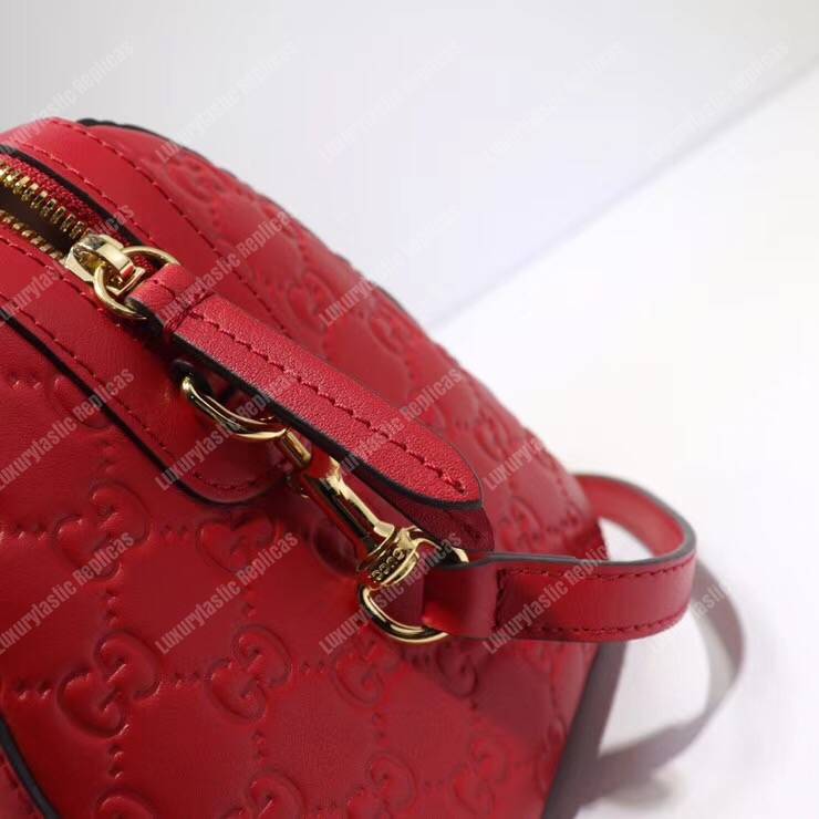 G*u*i signature medium top handle bag red