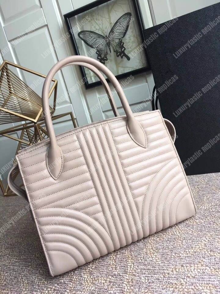 Pra*a diagramme leather handbag powder pink