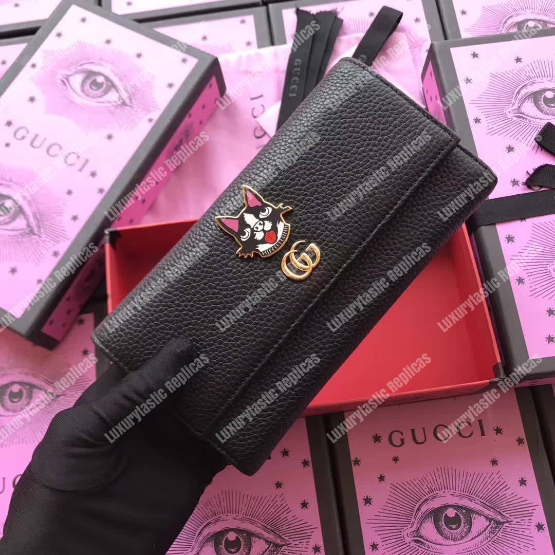 G*u*i leather wallet with bosco in black