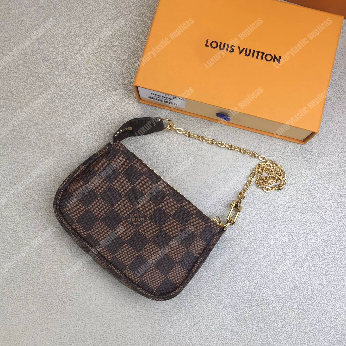 LV Mini Pochette Accessoires Damier Ebene