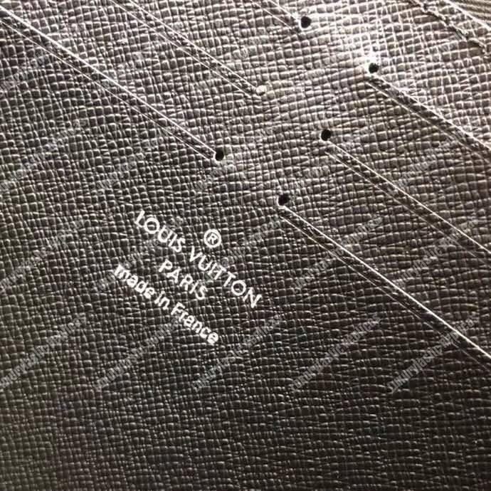 LV Pochette Voyage Taiga Leather