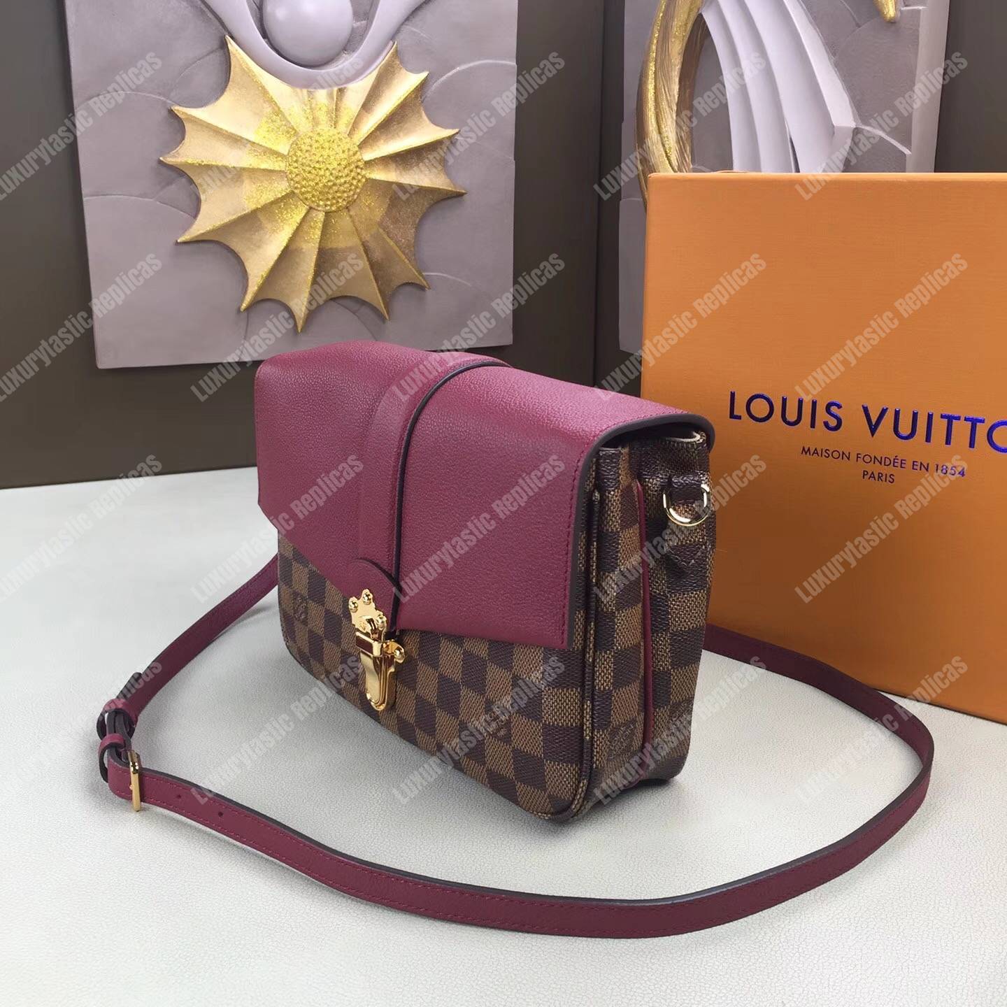 LV Clapton PM Damier Ebene Raisin