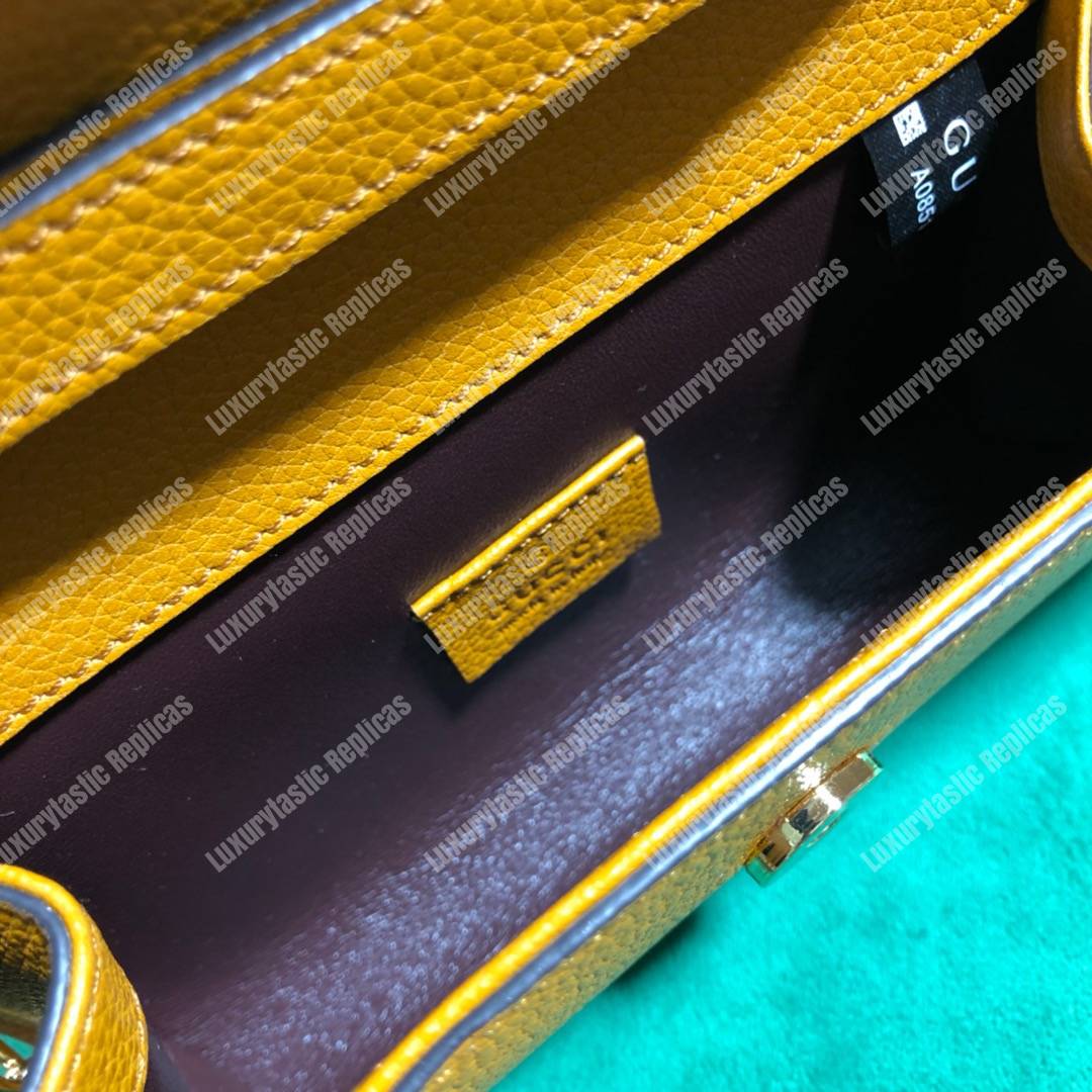 G*u*i zumi yellow smooth leather mini bag