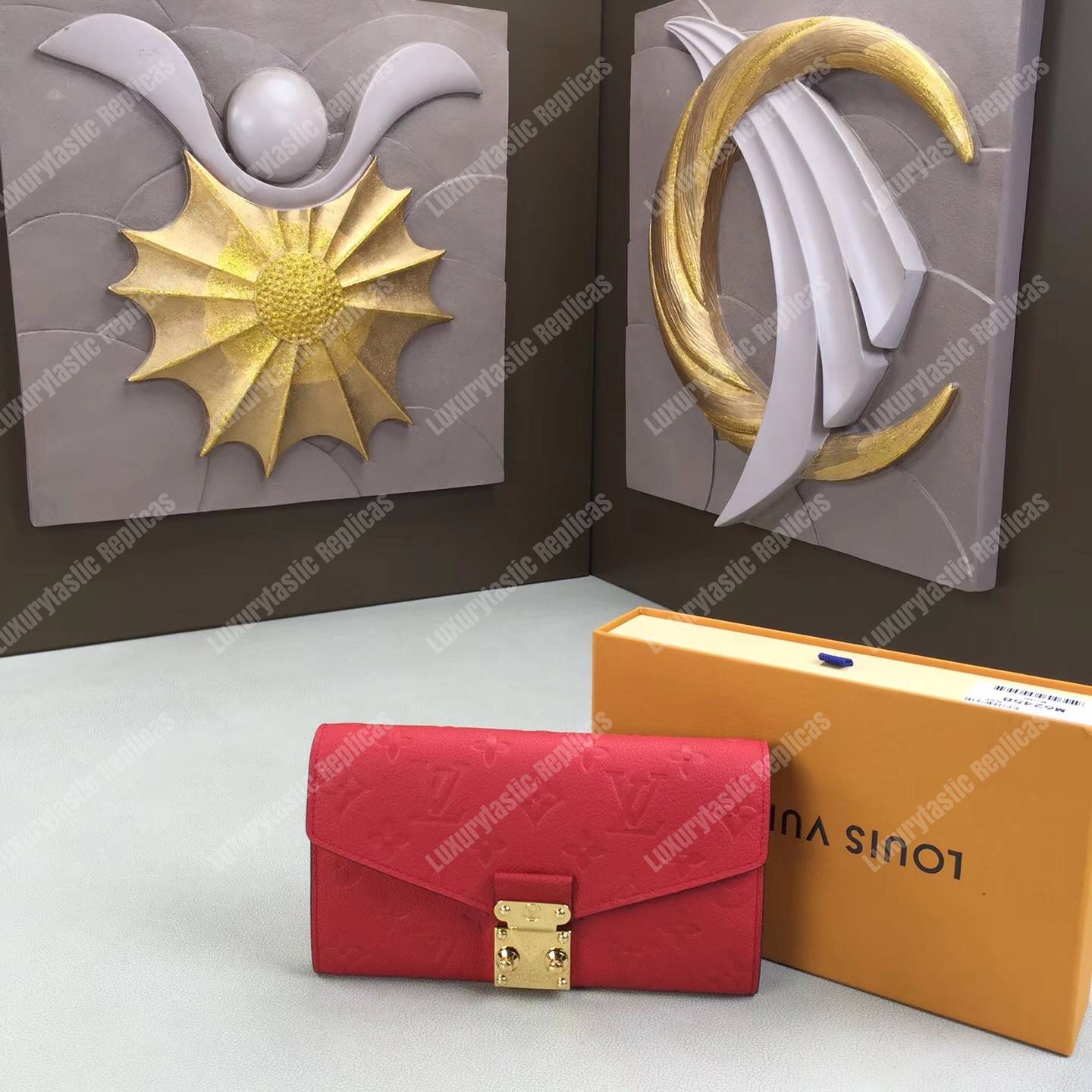 LV Metis Wallet Monogram Empreinte Leather Scarlet