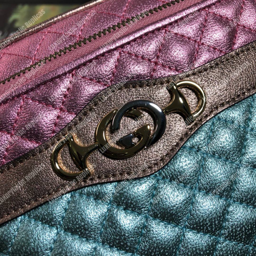 G*u*i zumi clutch metallic blue/pink