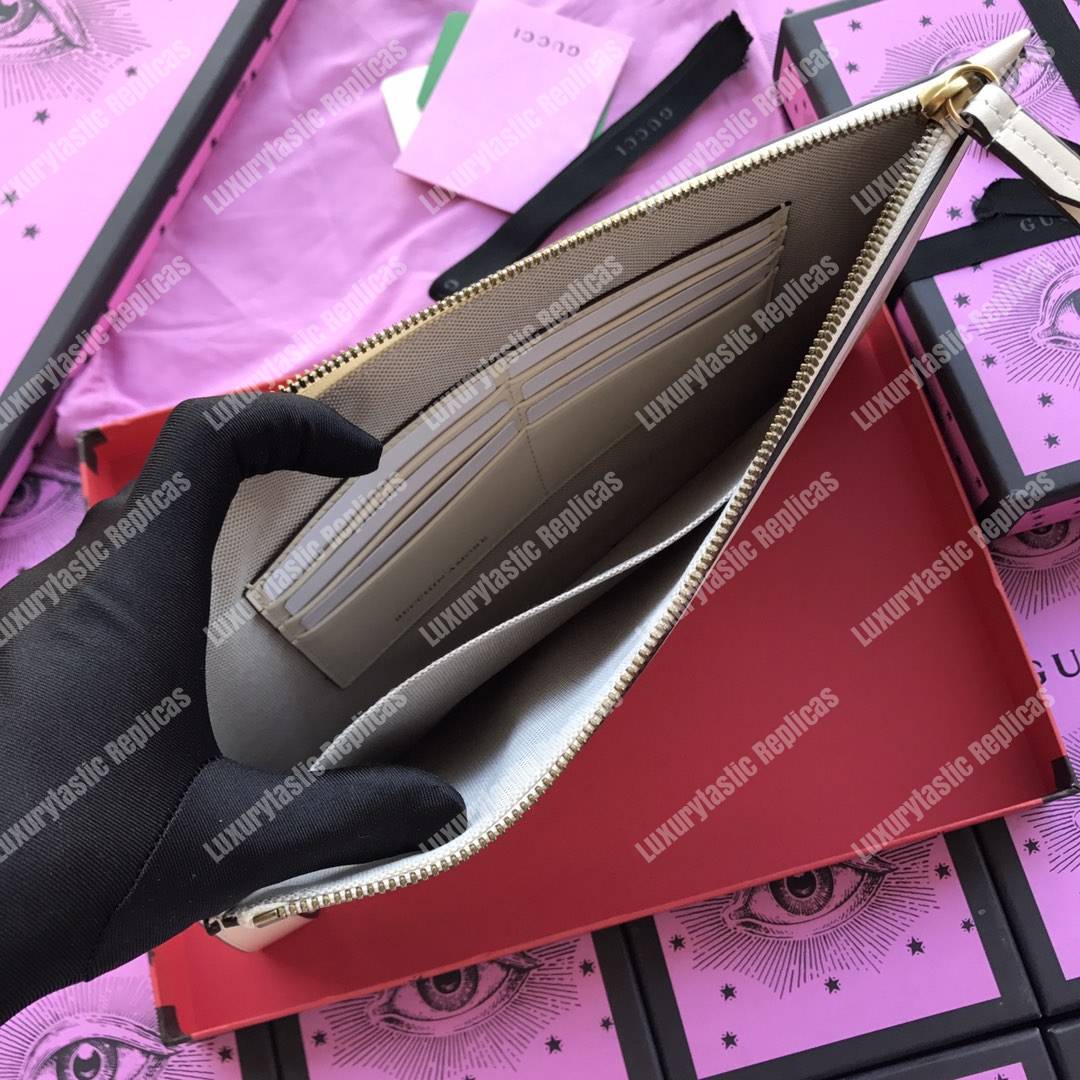 g*u*i G*u*iy print leather pouch bag white