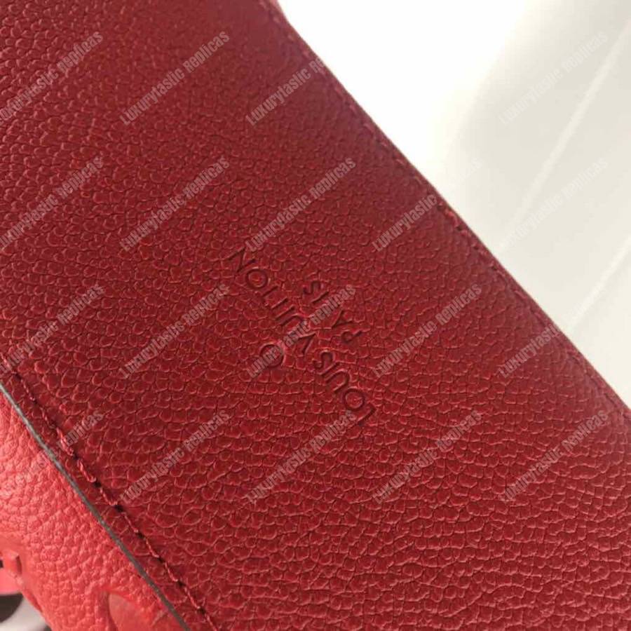 LV Saintonge Monogram Empreinte Leather Scarlet