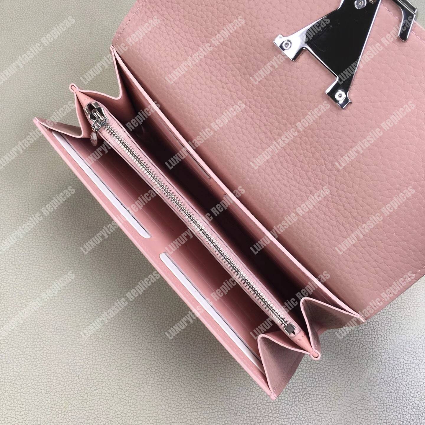 LV Capucines Wallet Magnolia