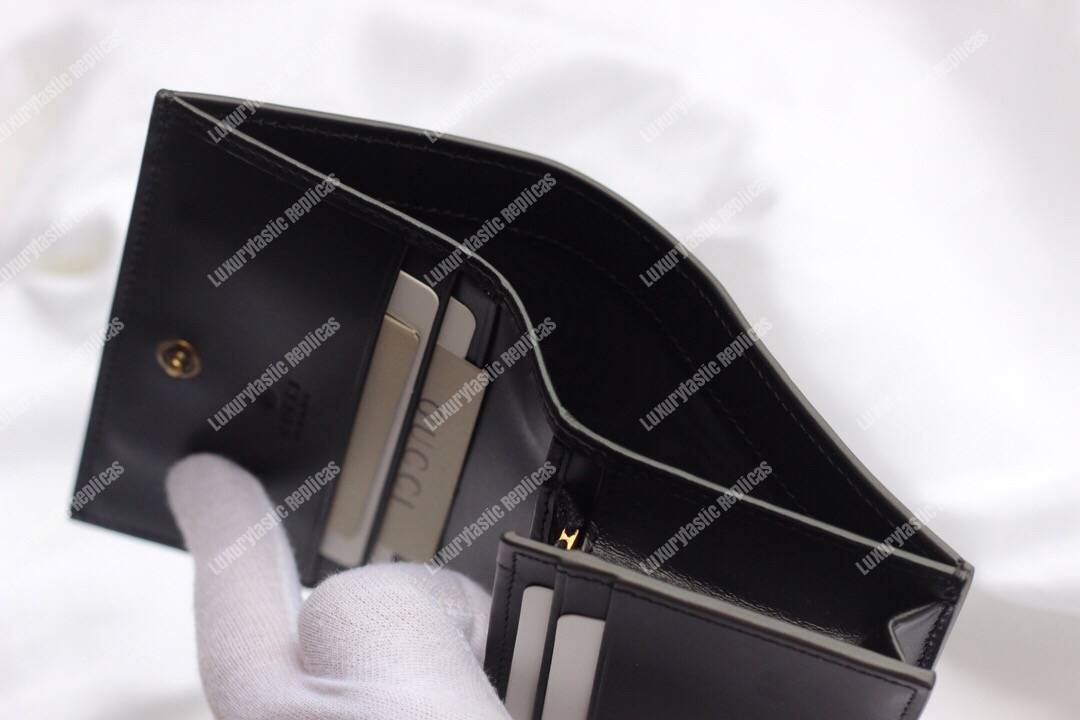 G*u*i signature card case with cat