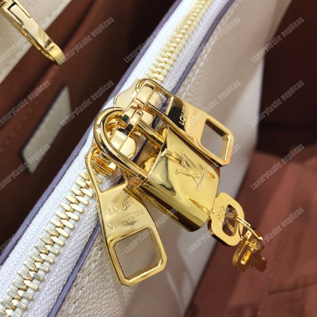 LV Montaigne MM Monogram Empreinte Crème Handbag