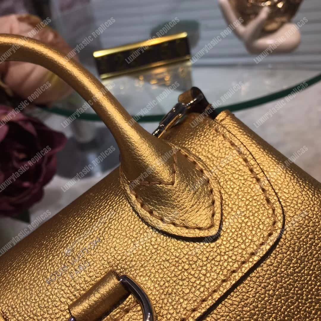 LV Lockme Backpack Mini Gold