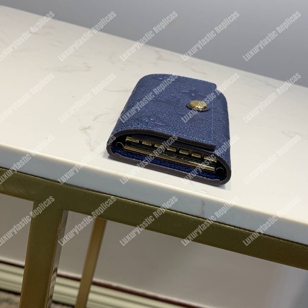 LV 6 KEY HOLDER Monogram Empreinte leather Iris