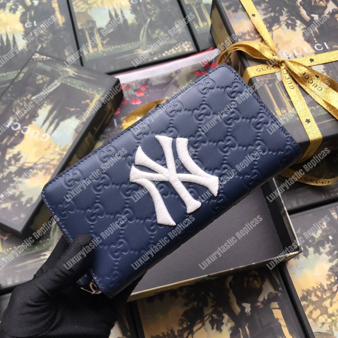 G*u*i blue zip around wallet with ny yankees™ patch