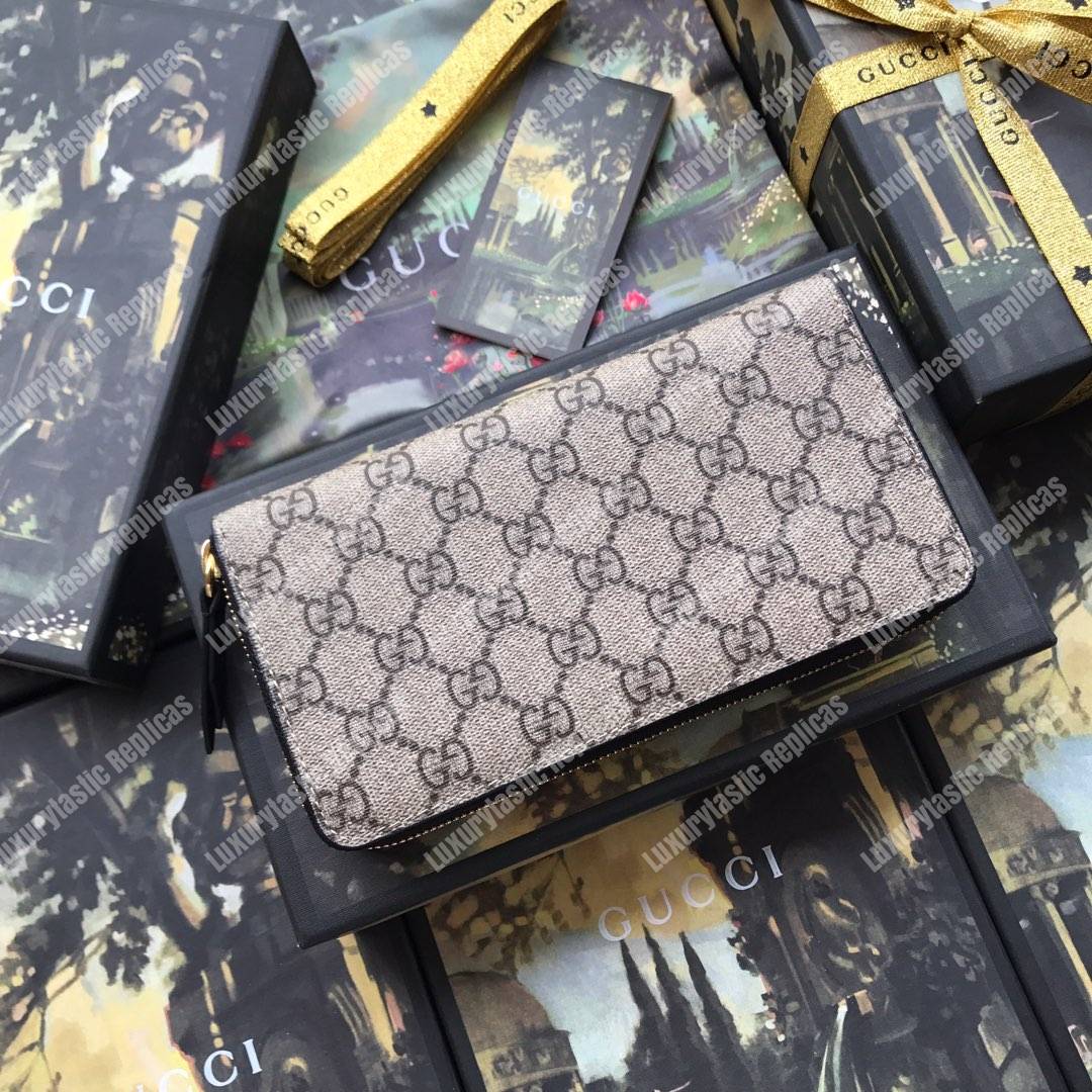 G*u*i sup*e zip around leather wallet black