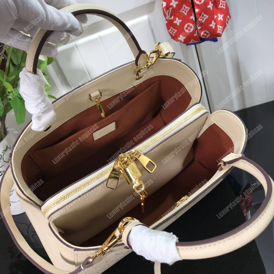 LV Montaigne MM Monogram Empreinte Crème Handbag