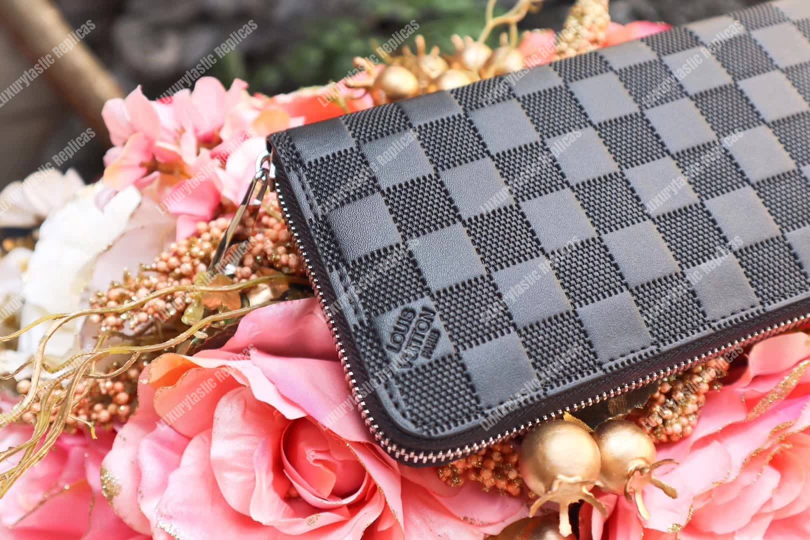 LV Zippy Wallet Vertical Damier Infini Leather Astral