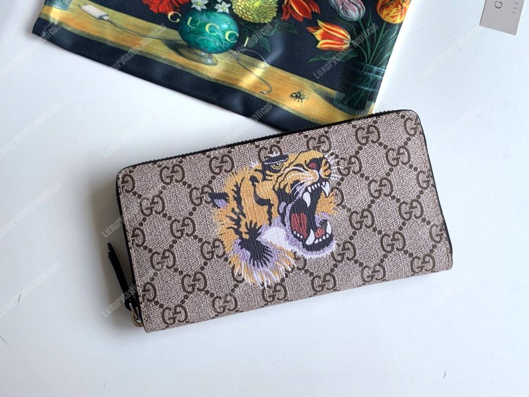 G*u*i tiger print gg sup*e zip around wallet beige/ebony