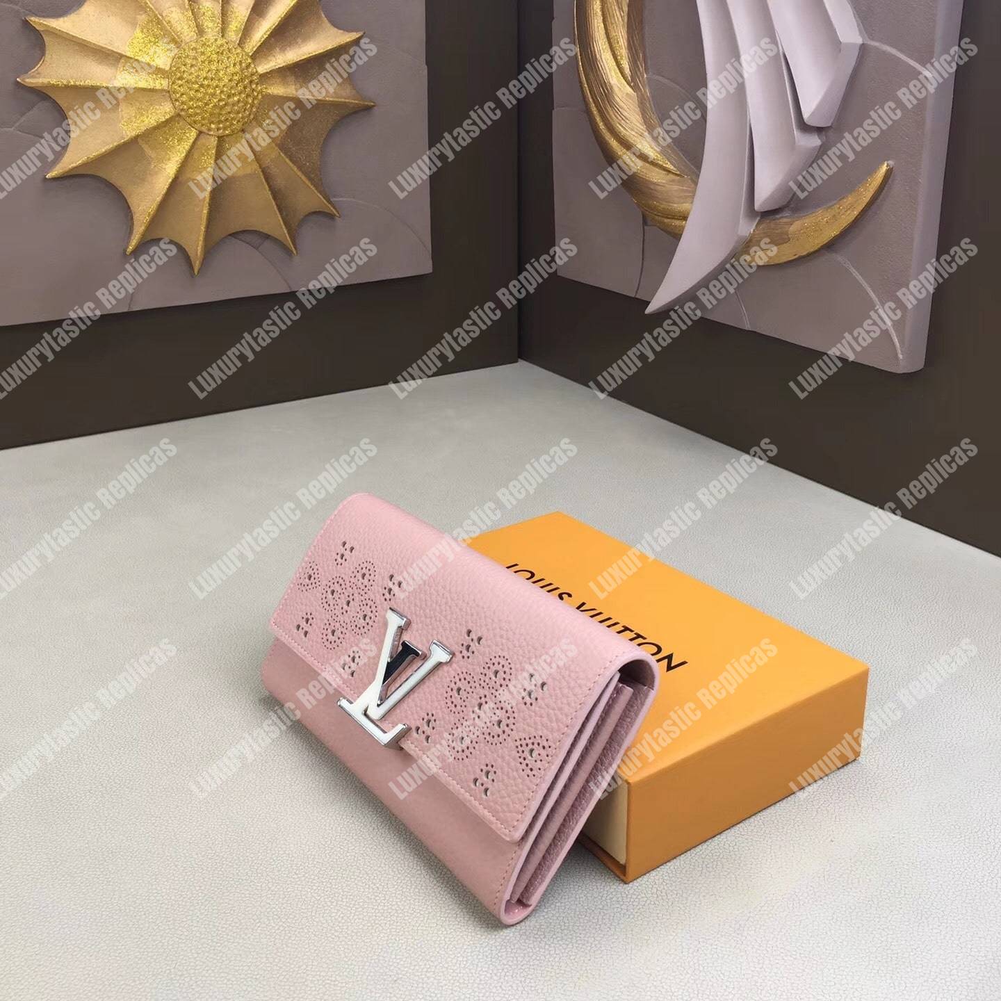 LV Capucines Wallet Magnolia