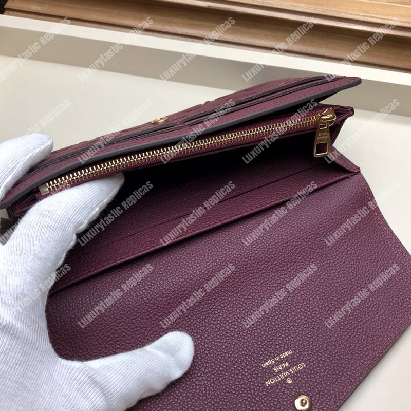 LV Sarah Wallet Monogram Empreinte Leather Raisin Purple