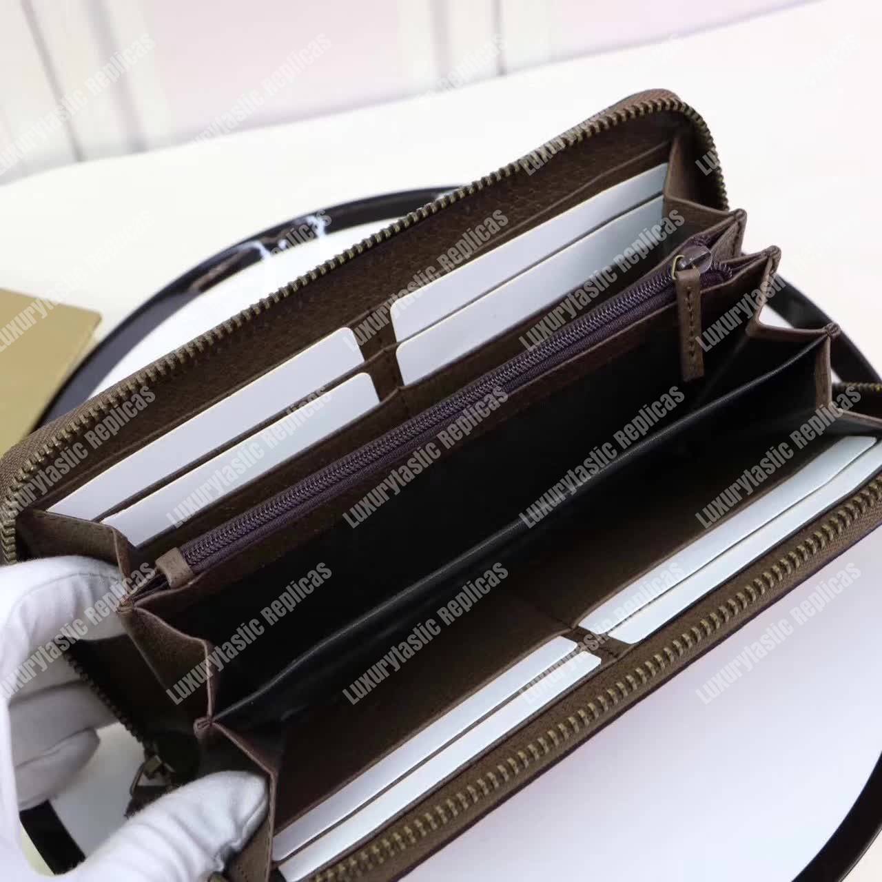 G*u*i leather zip around wallet with web brown