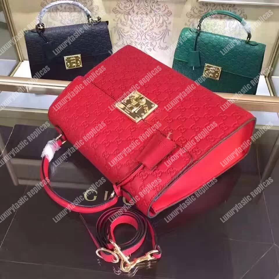G*u*i padlock medium signature top handle bag red