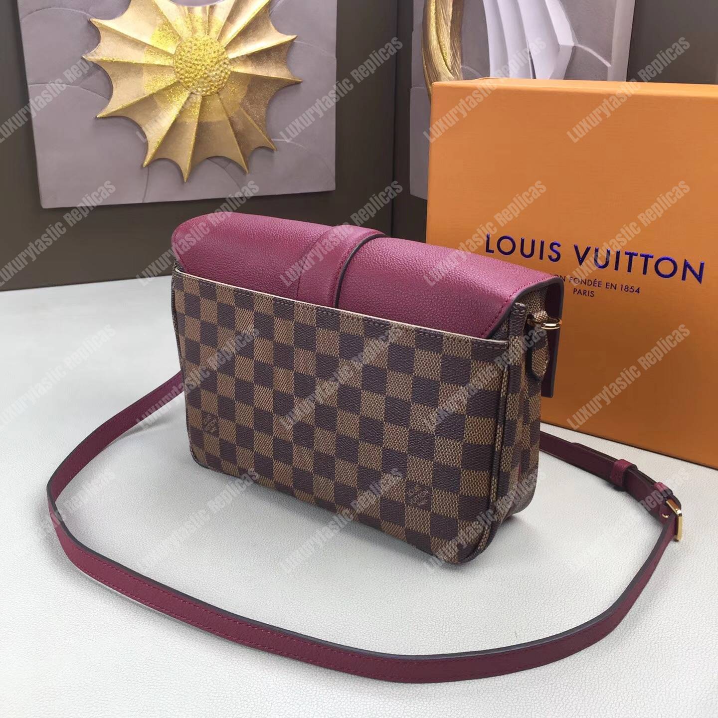 LV Clapton PM Damier Ebene Raisin