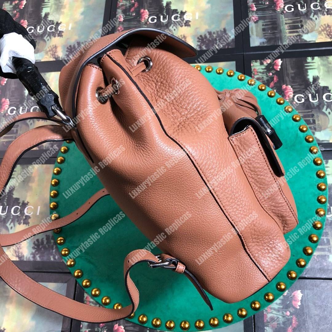 G*u*i leather bamboo tassel backpack light brown