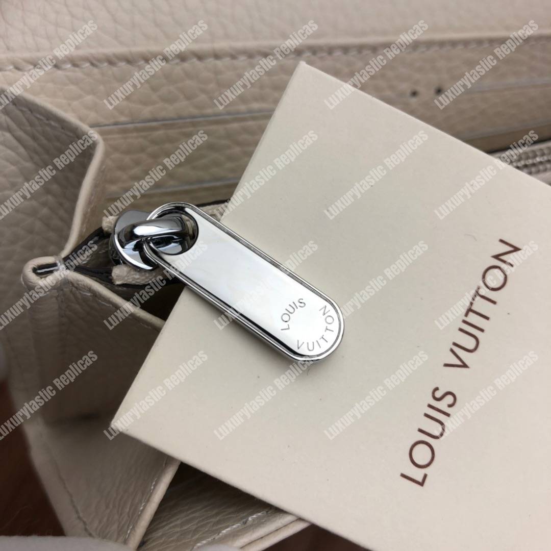 LV Iris Wallet Mahina Leather Ivory