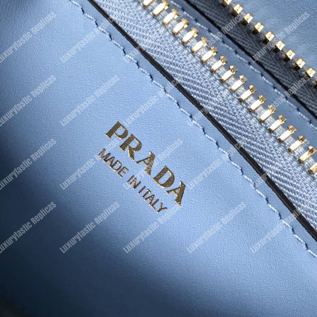 Pra*a monochrome saffiano leather bag light blue