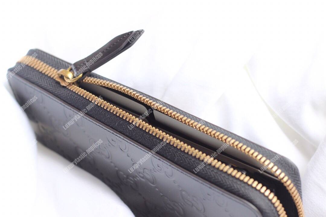 G*u*i signature zip around wallet with cat