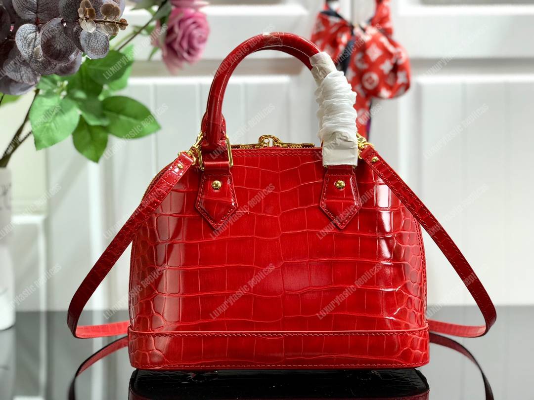LV Alma BB Crocodilien Brillant Cerise