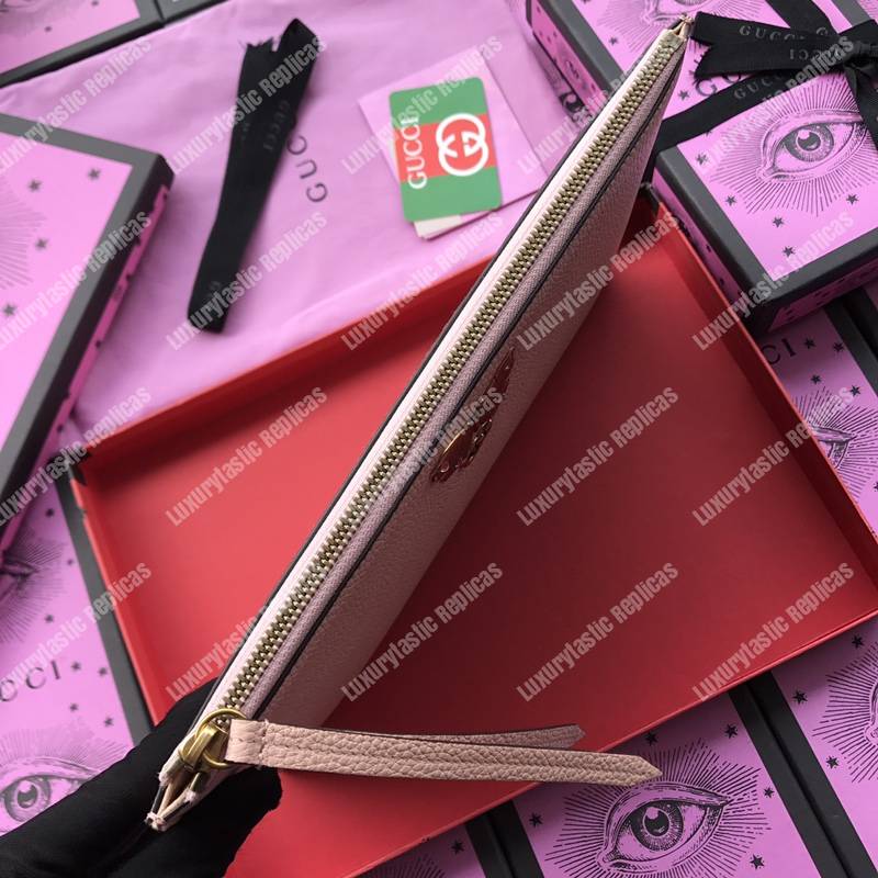 G*u*i leather pouch with butterfly pink