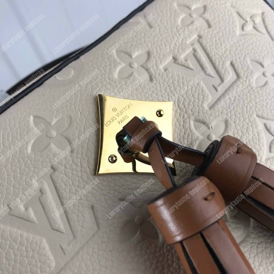 LV Saintonge Monogram Empreinte Leather Creme Caramel