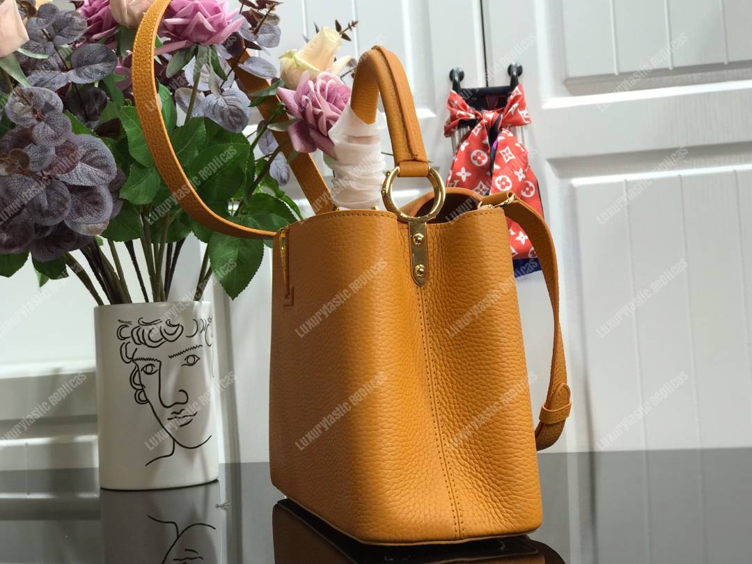 LV Capucines PM Taurillon Leather Ocre