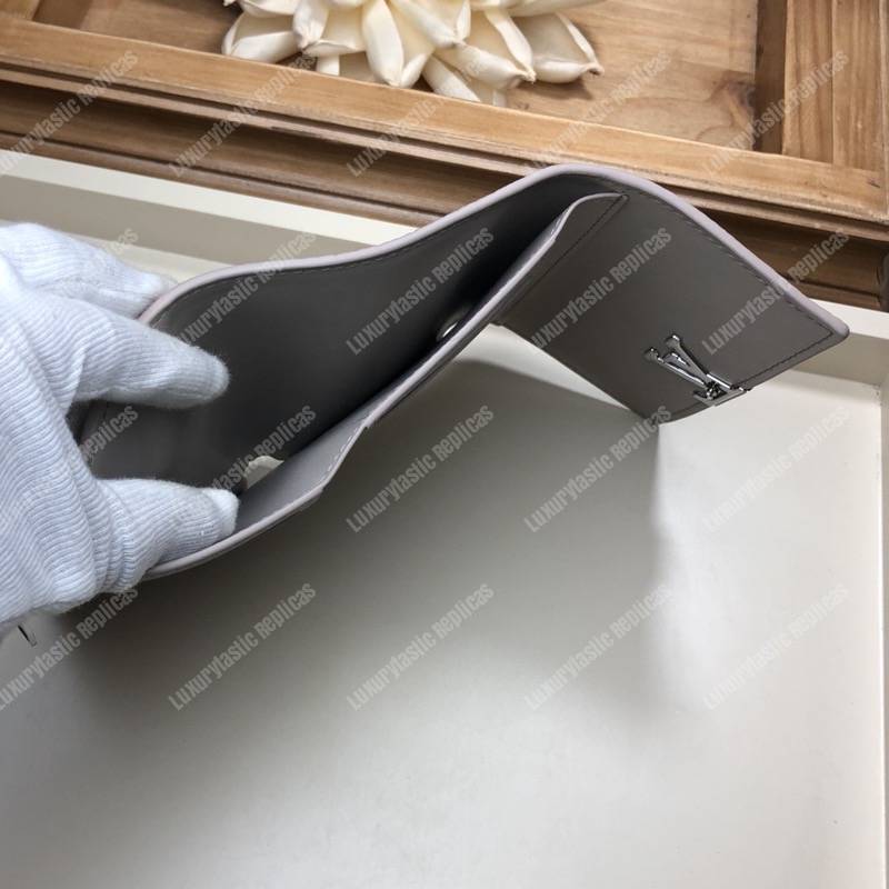 LV Capucines Compact Wallet Taurillon Magnolia Leather Monogram Flowers