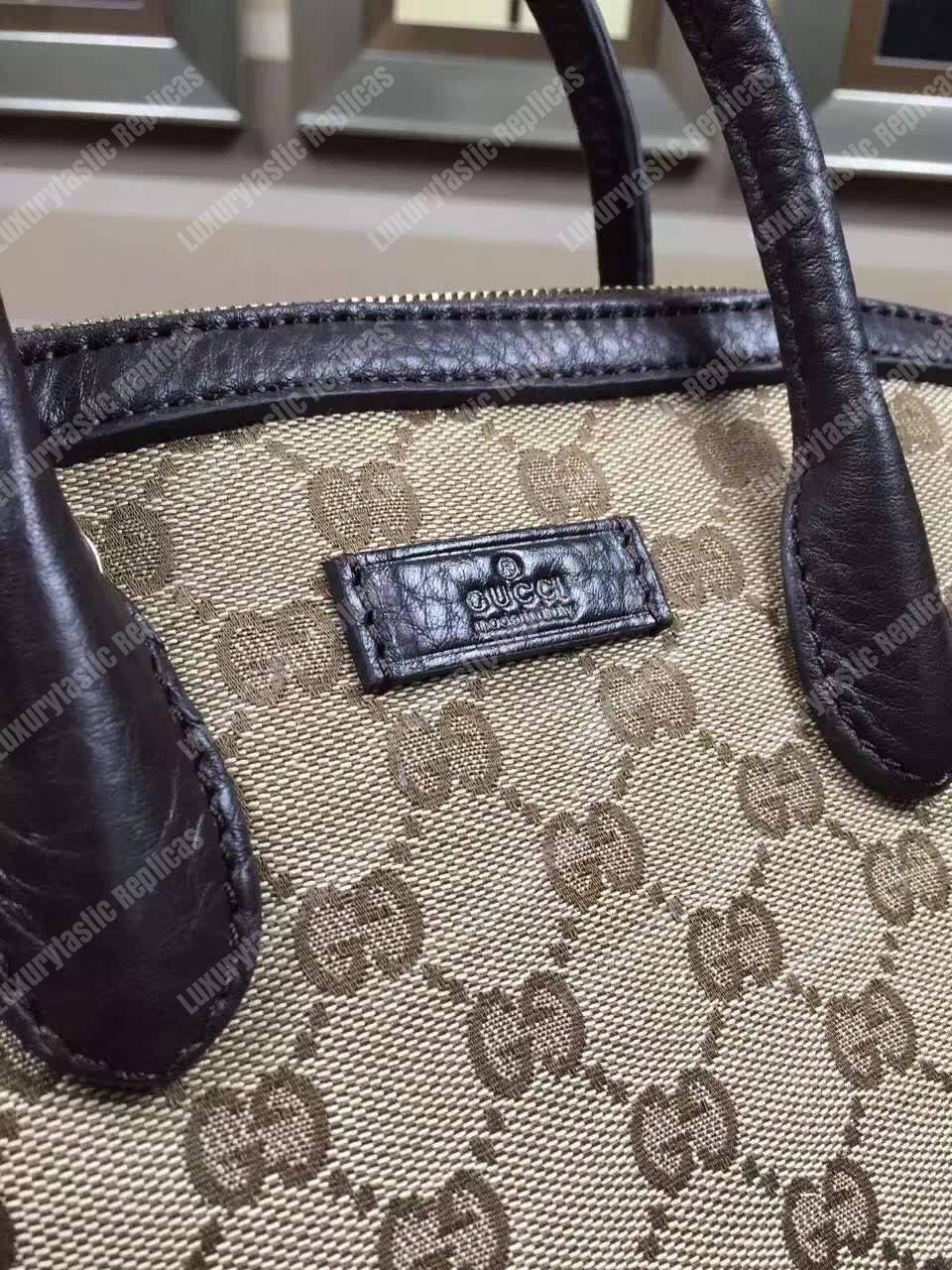 G*u*i gg canvas top handle bag black