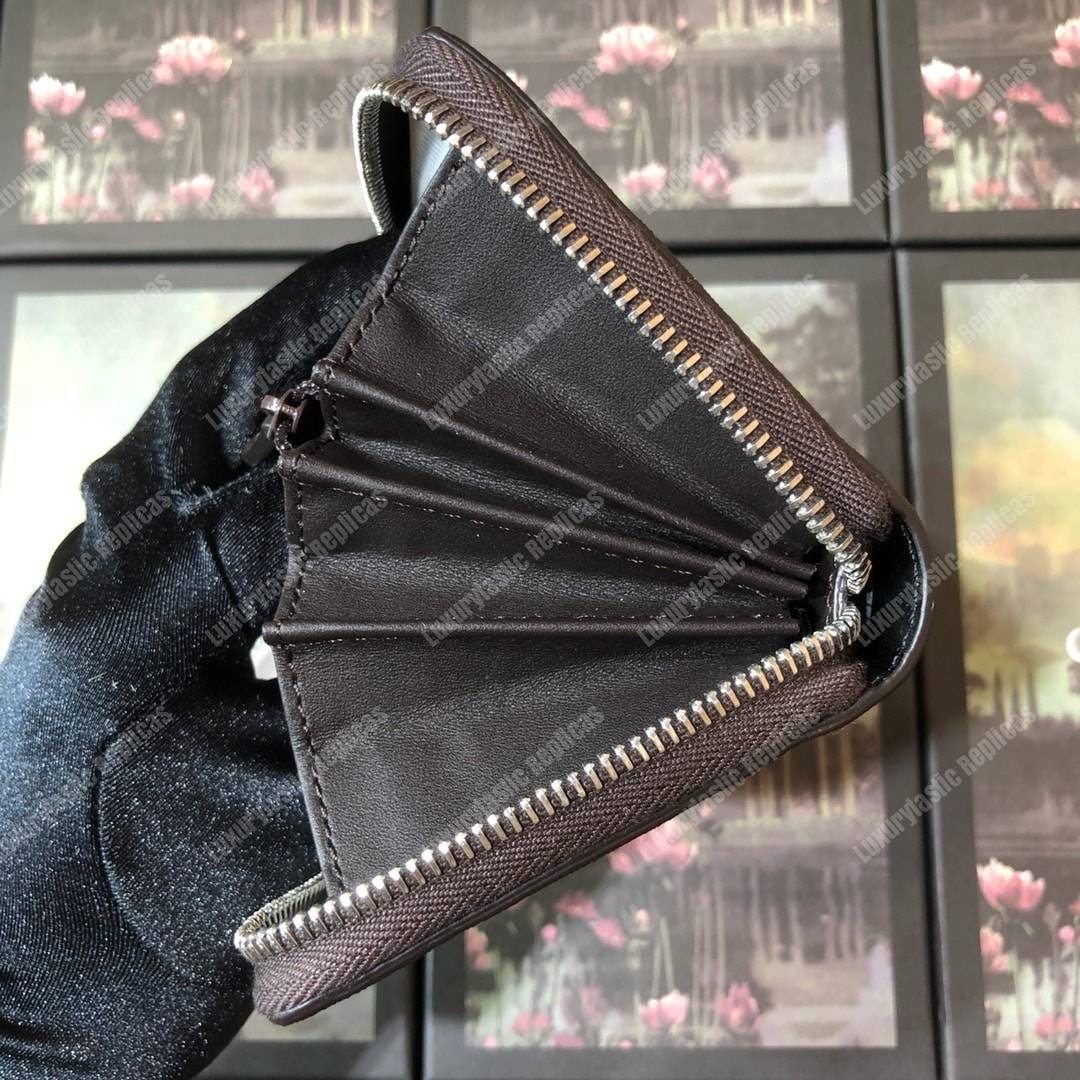 G*u*i web gg sup*e zip around wallet bee