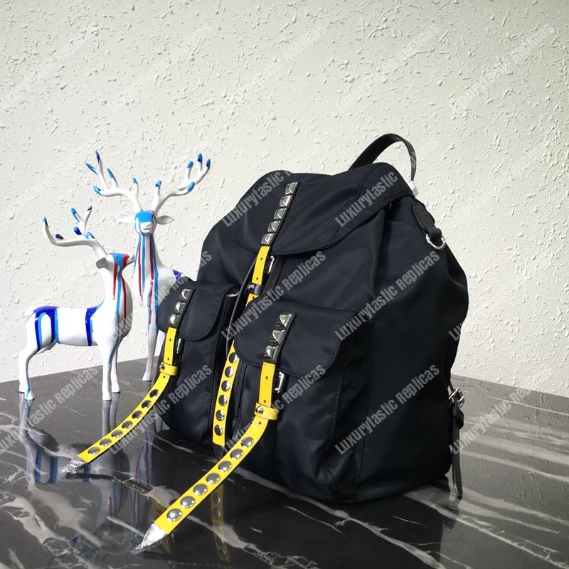 Pra*a black nylon backpack yellow