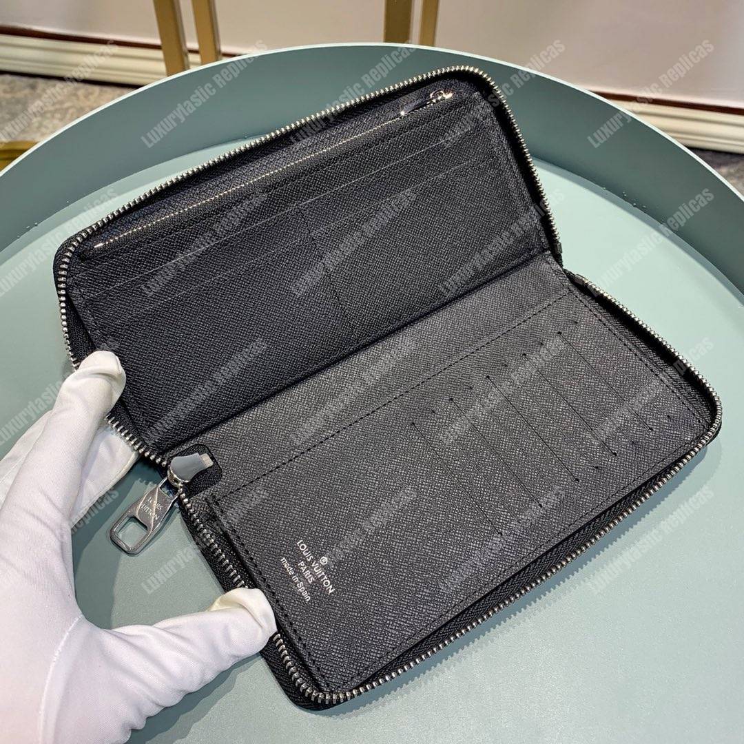 LV Zippy Wallet Vertical Taiga Leather Blue Trim