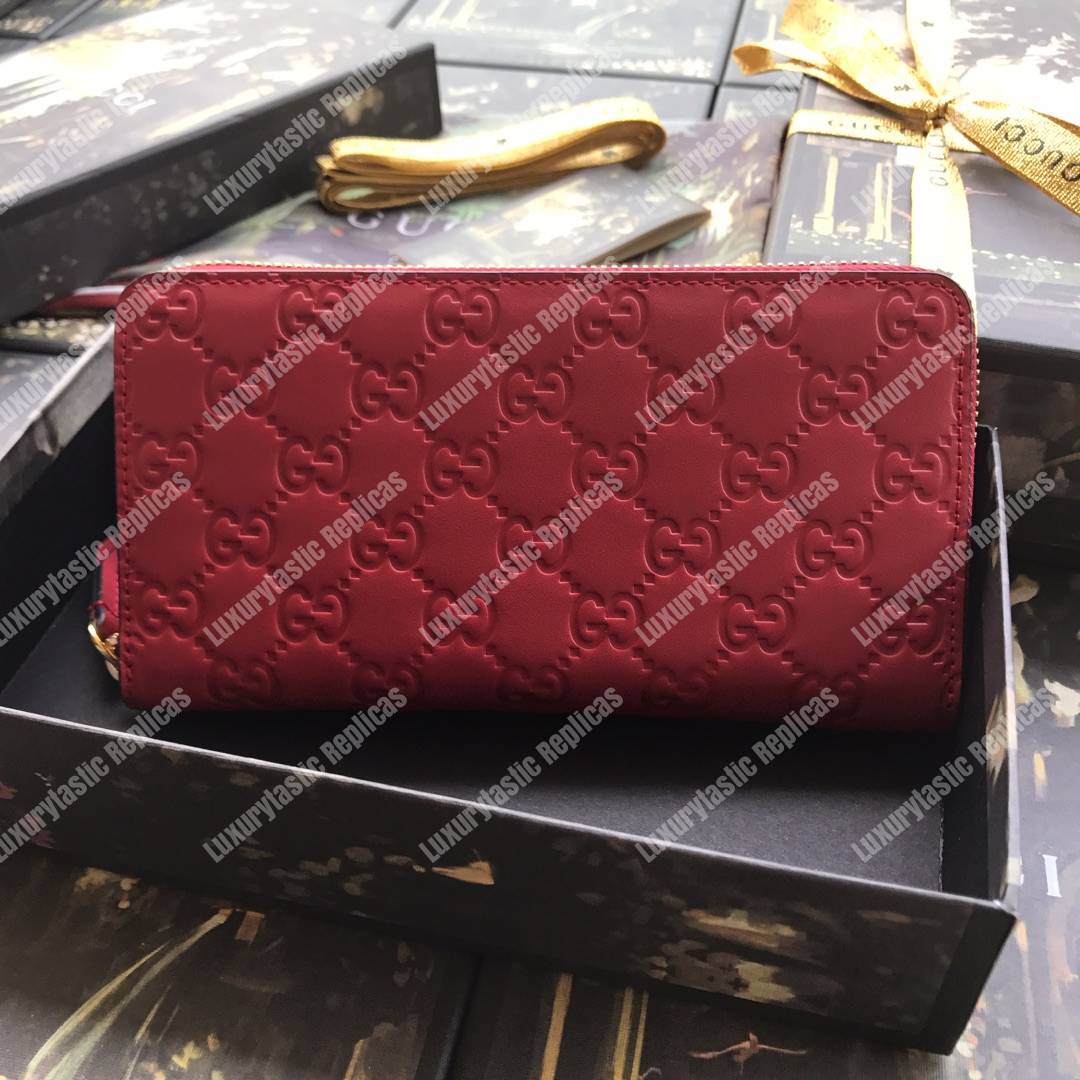 G*u*i signature zip around leather wallet red