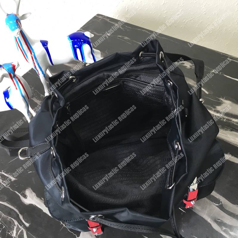 Pra*a black nylon backpack red