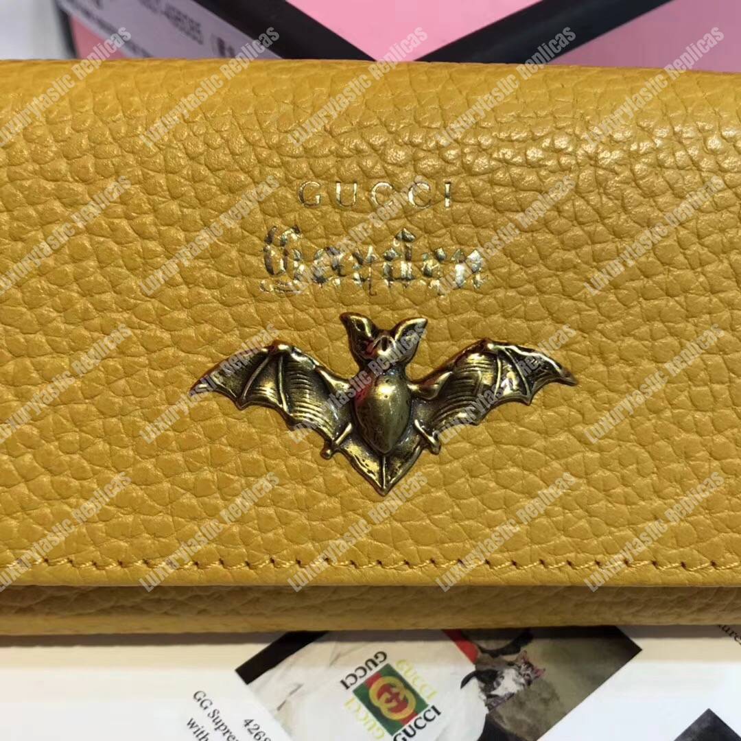 G*u*i garden leather key case yellow with bat