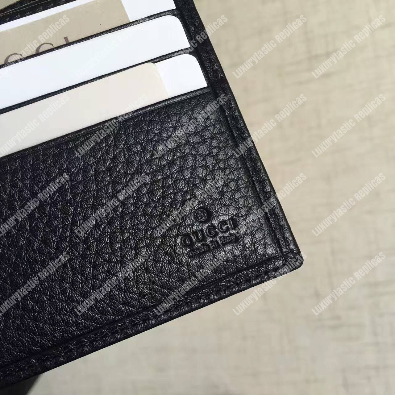 G*u*i leather bi-fold wallet black