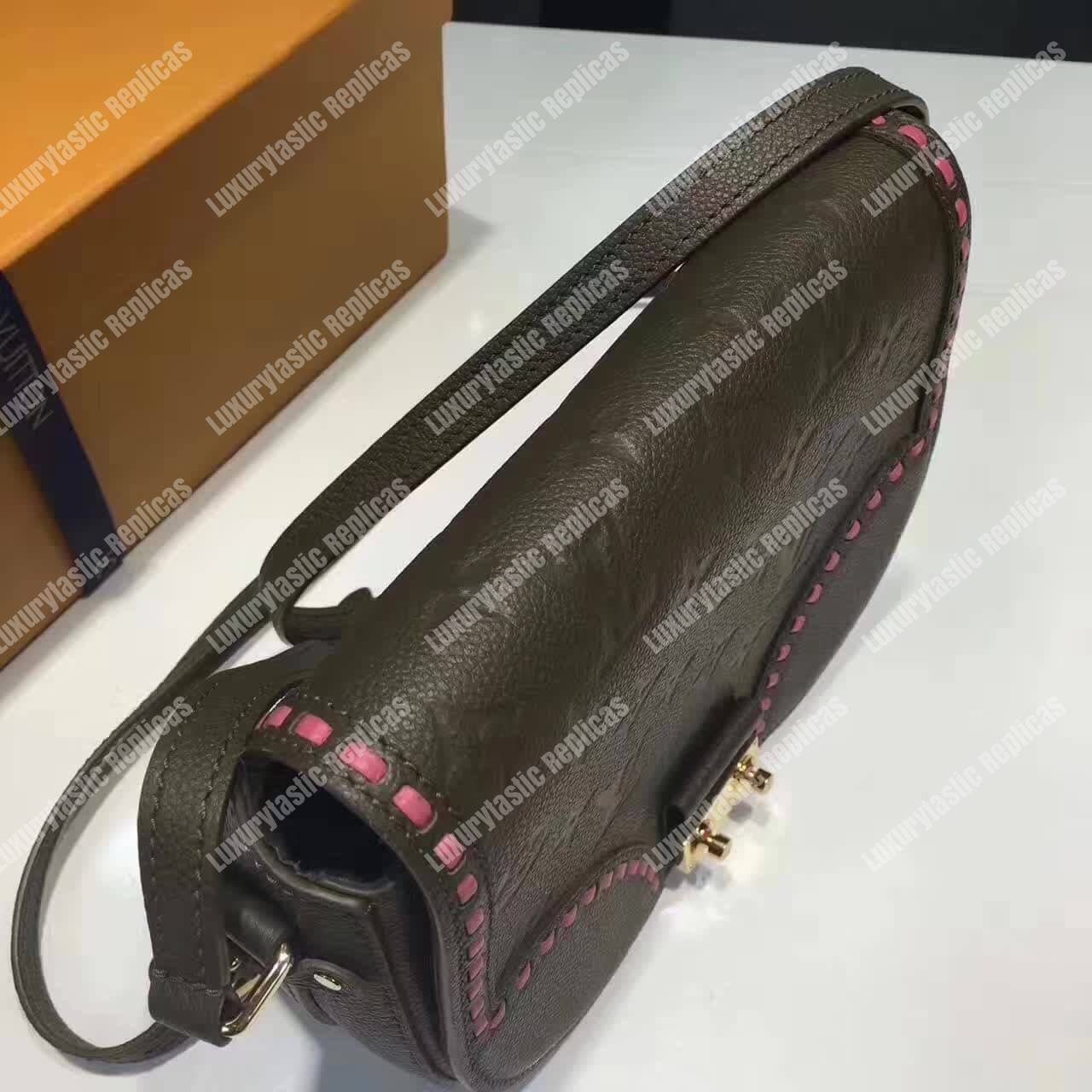 LV Junot Monogram Empreinte Leather