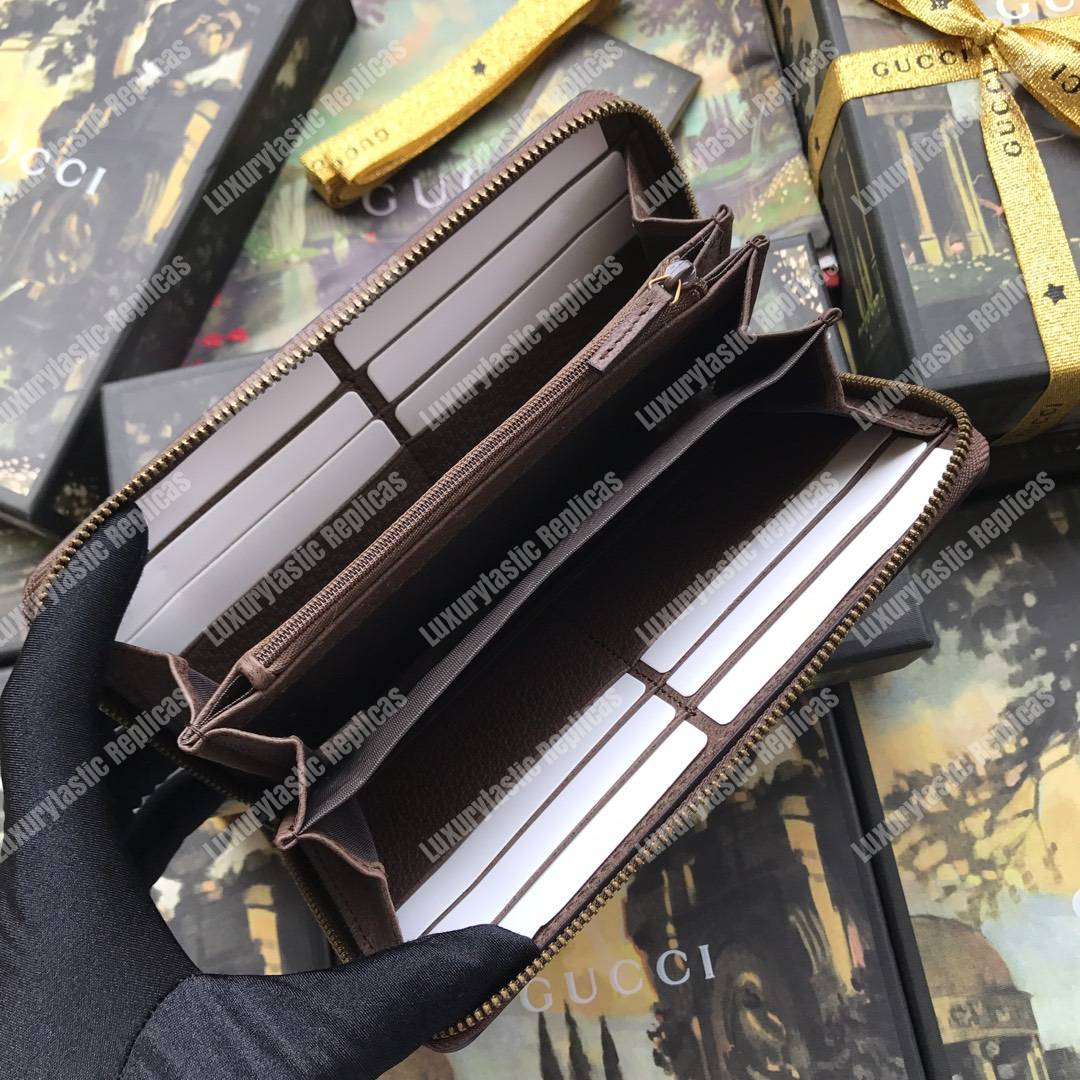 G*u*i chevron sup*e zip around leather wallet brown