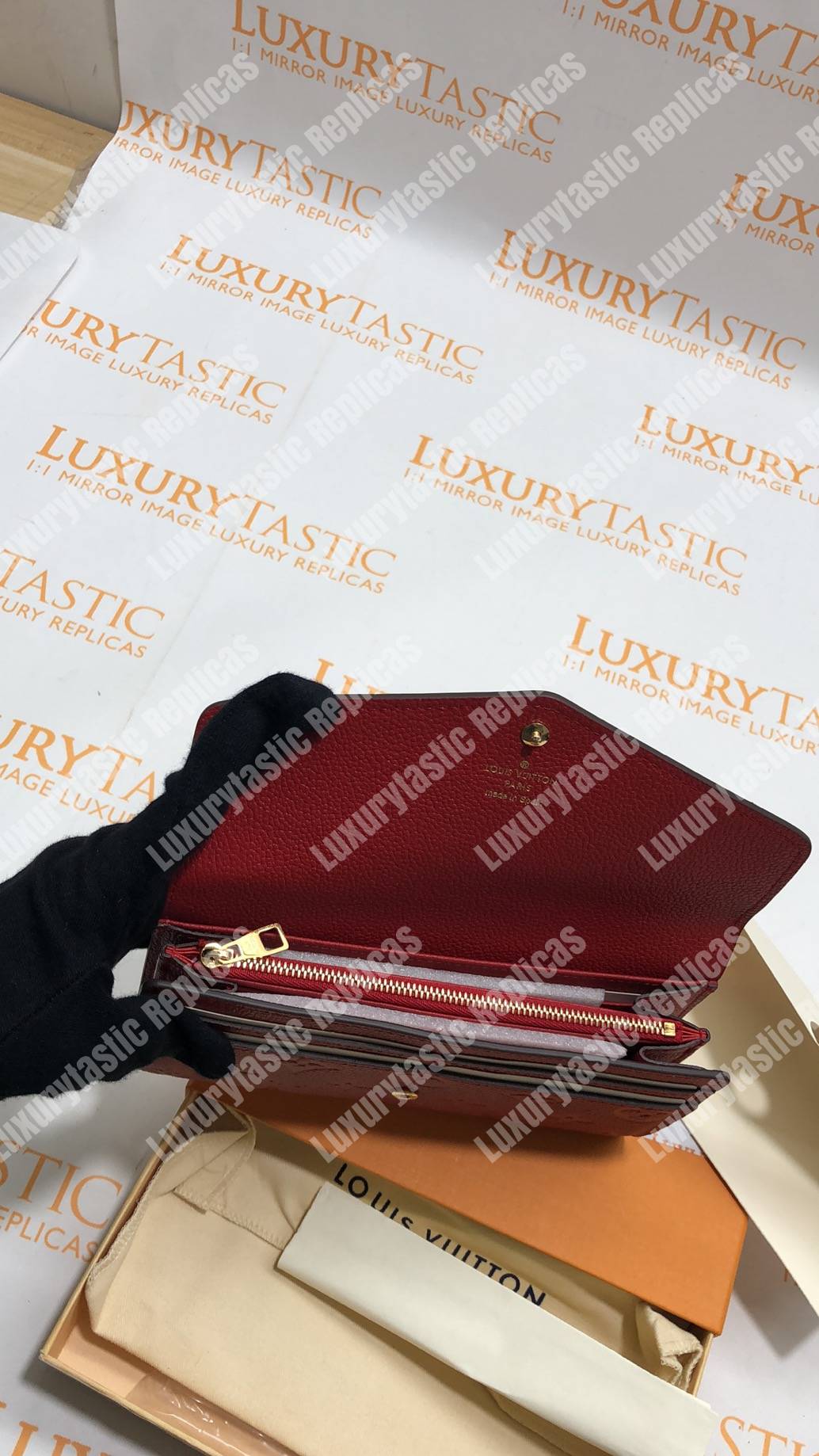 LV Sarah Wallet Monogram Empreinte Leather Scarlet