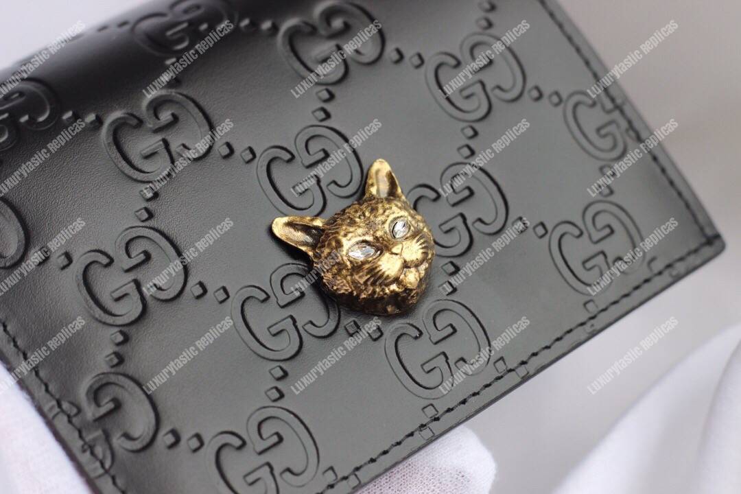 G*u*i signature card case with cat