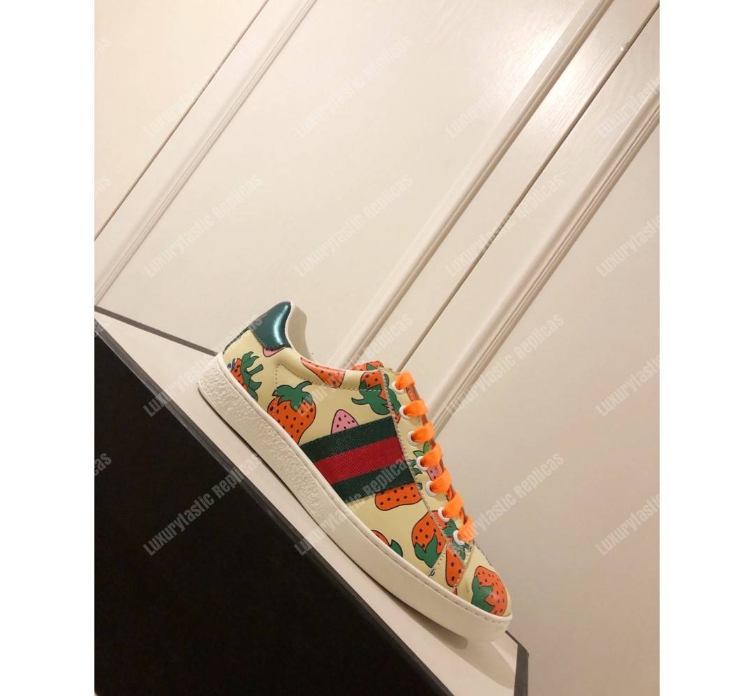 G*u*i ace sneaker with G*u*i strawberry print