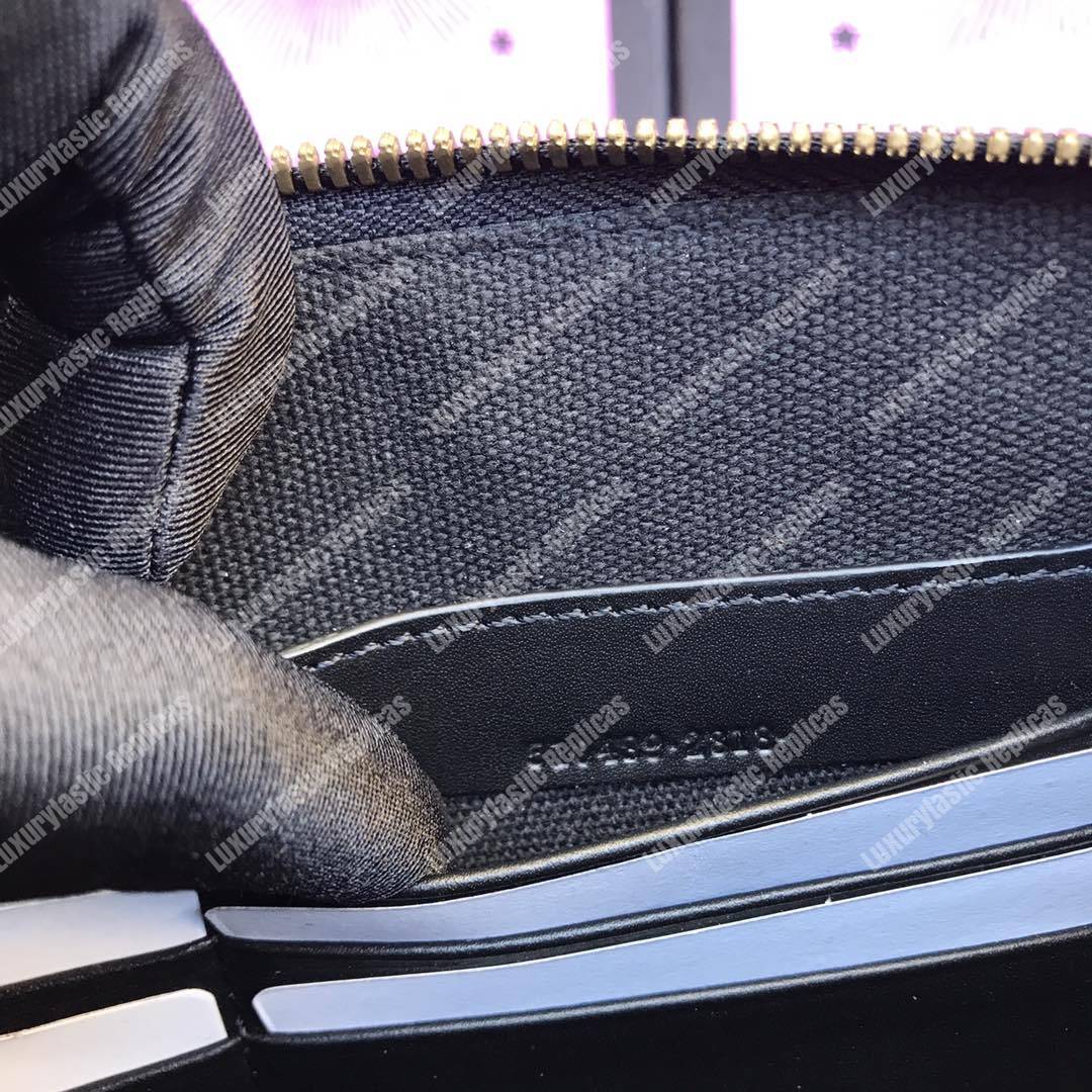 g*u*i G*u*iy print leather pouch bag black